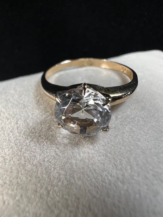 This gold-filled ring with a beautiful clear white spinel is fine piece of jewelry, as well as an affordable alternative to a diamond ring.